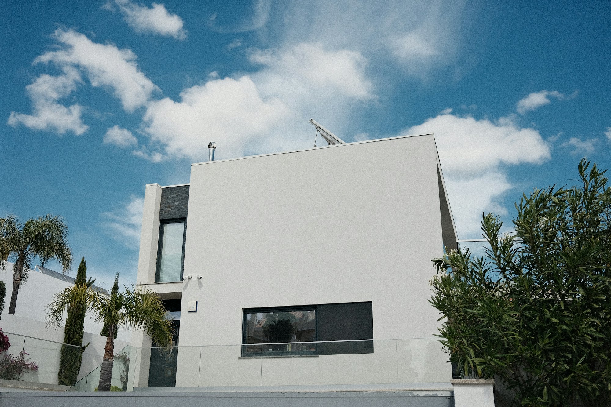 Facade of Residencia Altavista with deep window reveals