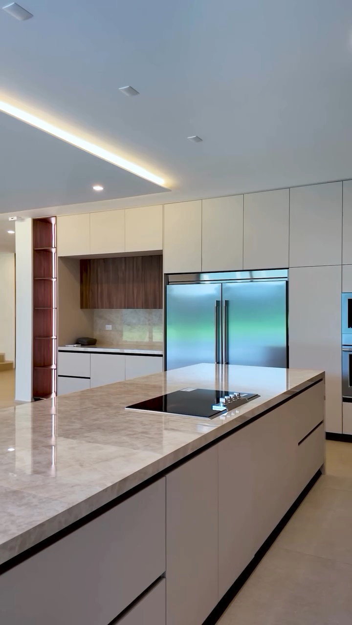 The kitchen island and fitted cabinetry, a still from the walkthrough